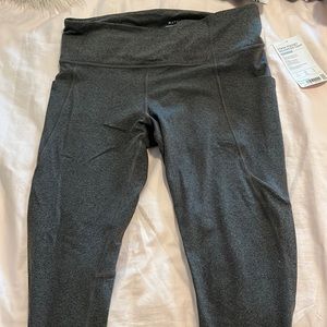 Stash Pocket Salutation Tight